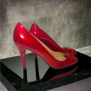 Stuart  Weitzman, candy apple red heels with peep toe, 7 1/2 narrow